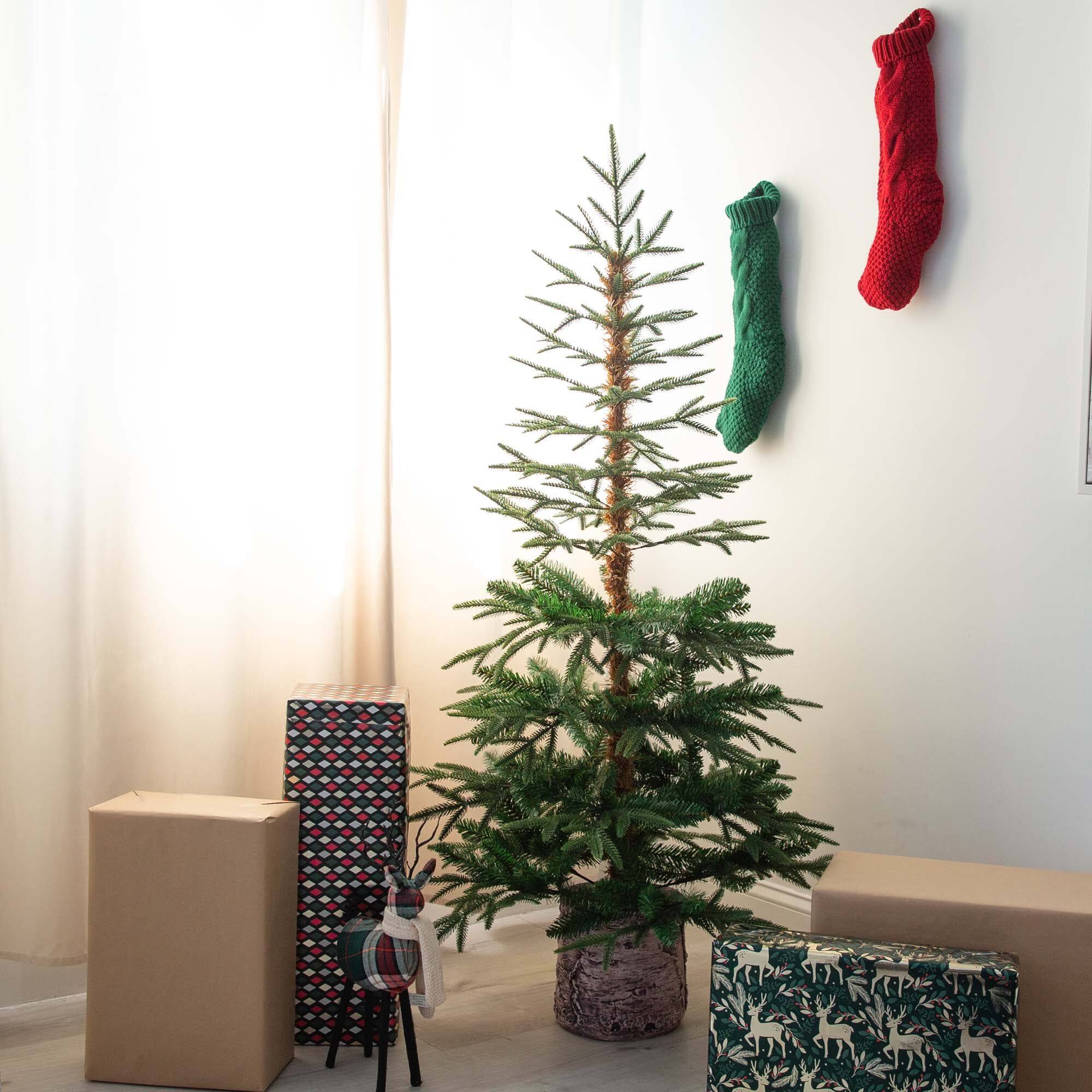 5ft. Unlit Woodland Fir Artificial Christmas Tree in Decorative Planter